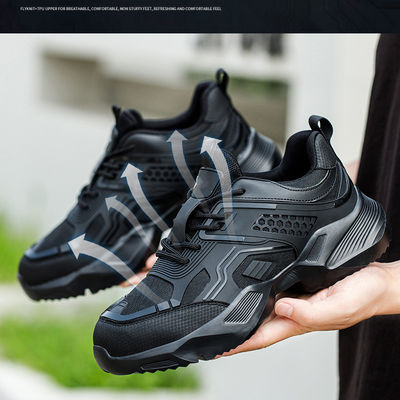 耐久性のある黒色カスタムロゴ 安全靴 透けるTPU フライング ニットとケヴラーミッドソール